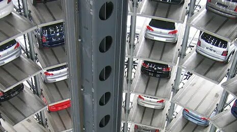 Multi-story car parking system with cars arranged vertically in a mechanical lift