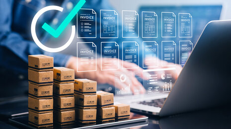 Digital invoicing workflow visualized with multiple electronic invoice icons, a verification checkmark, and stacked parcel boxes beside a laptop, symbolizing automated order fulfillment and compliant e-invoicing.