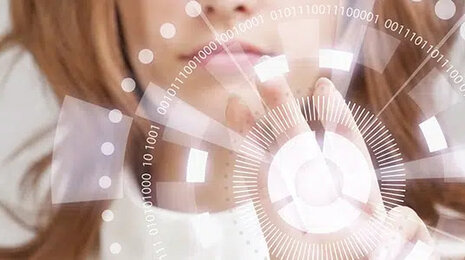 Woman interacting with a futuristic digital interface, touching a glowing circular hologram symbolizing technology, data, or digital innovation.