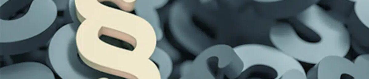 W miejscu centralnym na grafice znajduje się symbol paragraf "§"