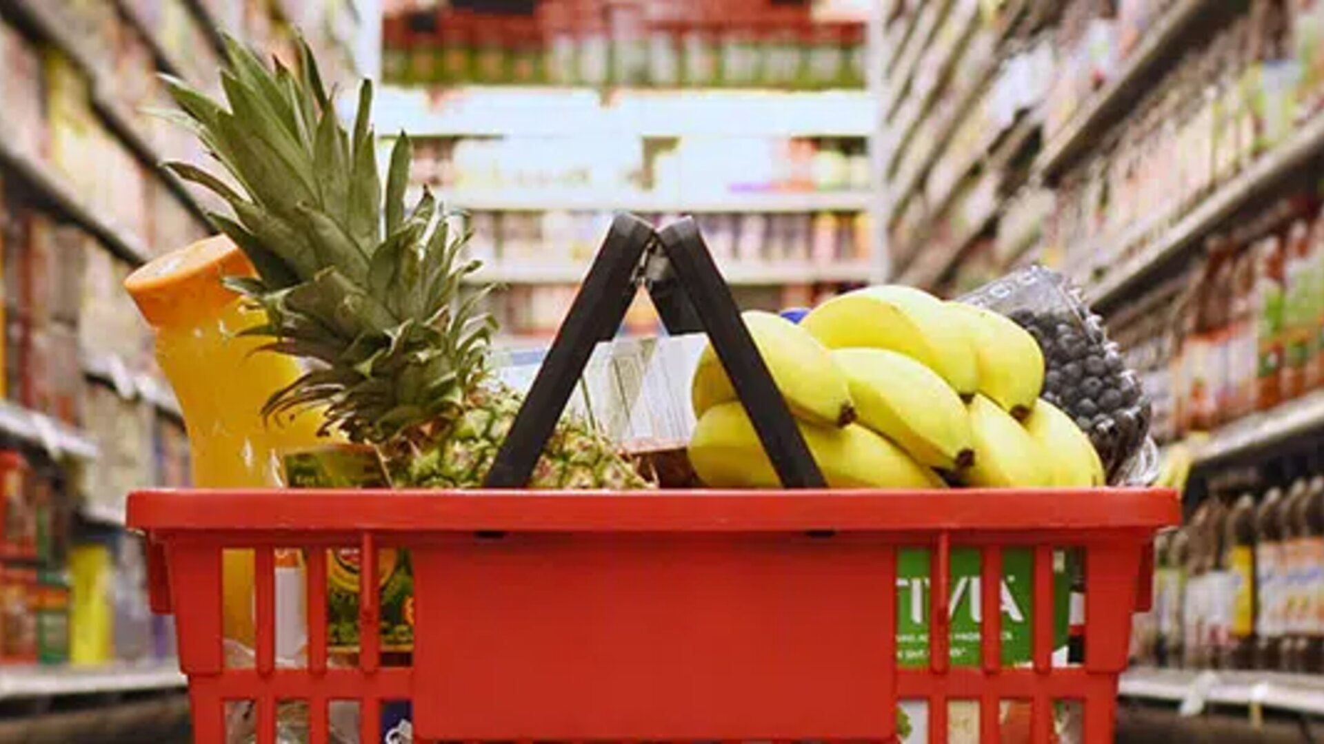 Loaded shopping cart in a grocery store