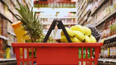 Loaded shopping cart in a grocery store